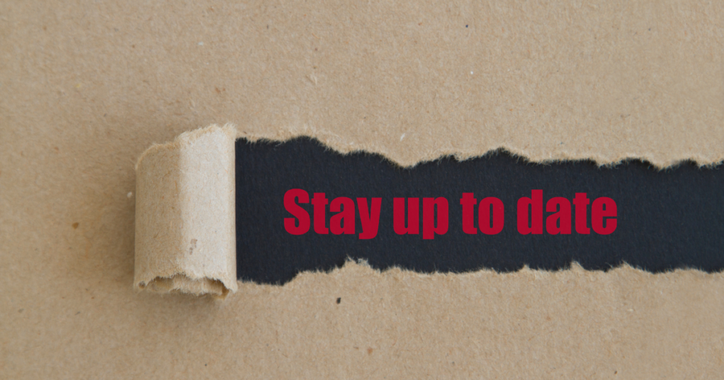 a brown paper image with a section torn away with letters underneath saying 'stay up to date' 